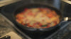 Four videos back to back of different closeups of food being prepared.